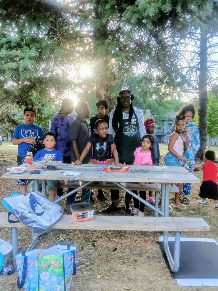 Global Support Initiatives in collaboration with Growing Together Community Garden uses North Dakota State University Nutrition Education Curriculum to educate children on plants and benefits of vegetables